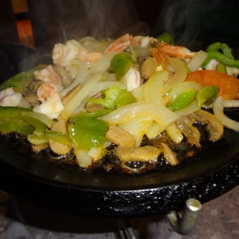Marcelinos Mexican Restaurant - a plate of food being cooked - Mexican Near Me - Apple Valley, California