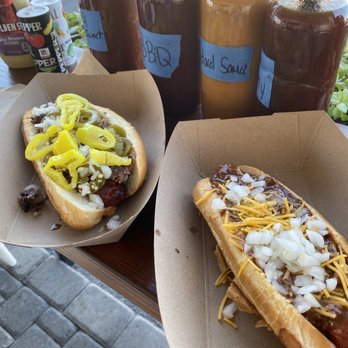 Caldwell County Mexi-Q - Brisket (left) chili dog (right) plus all the yummy sauces! - Barbeque Near Me - Gilbert, Arizona Caldwell County Mexi-Q - Brisket (left) chili dog (right) plus all the yummy sauces! - Barbeque Near Me - Gilbert, Arizona