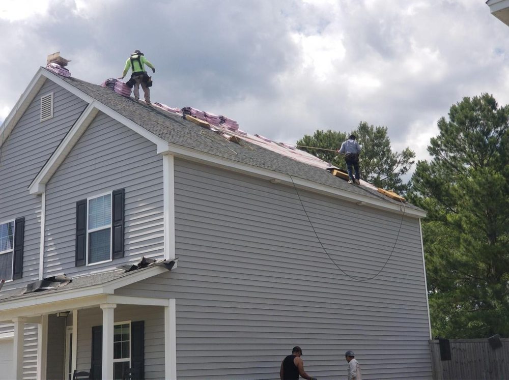 Slide of Hixon's Roofing