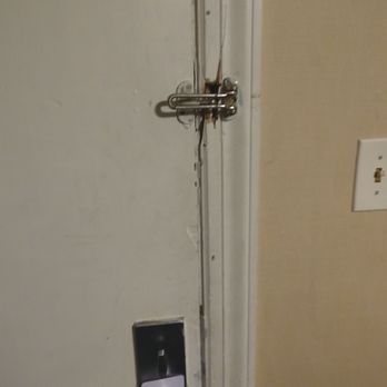 Monticello Motel - Main door to room the safety lock on top could not work due to damage of some one breaking into it - Hotels Near Me - Framingham, Massachusetts