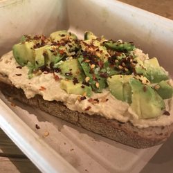 The Hilltoss - Avocado toast with hummus and chili flakes - a great pre-workout lunch!