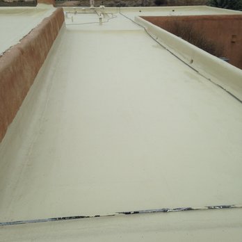 Storm Roofing - Silicone Roof Coating system for Low Slope roofing 4500 square feet applied project completed April 2016 - Roofing Near Me - Los Lunas, New Mexico