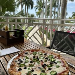 Mangroves Bar - Create your own pizza with 2 toppings
