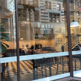 Exterior outside entrance of Tatte Bakery & Cafe | Emerson - Exterior - Boston, Massachusetts Exterior outside entrance of Tatte Bakery & Cafe | Emerson - Exterior - Boston, Massachusetts