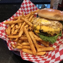Over easy egg burger with hot fries very tasty Over easy egg burger with hot fries very tasty