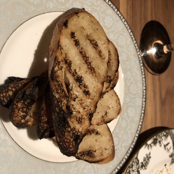 Monarch Restaurant - Crusty bread for the "Potato and Trout" - Steakhouses Near Me - Omaha, Nebraska