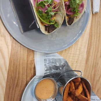 Buzz & Bites - Katy - Sweet Potato Fries: crispy outside, soft sweet potato inside. Pairs well with aioli. Mango Tacos: stuffed full, including lots of steak. - Coffee & Tea Near Me - Katy, Texas Buzz & Bites - Katy - Sweet Potato Fries: crispy outside, soft sweet potato inside. Pairs well with aioli. Mango Tacos: stuffed full, including lots of steak. - Coffee & Tea Near Me - Katy, Texas