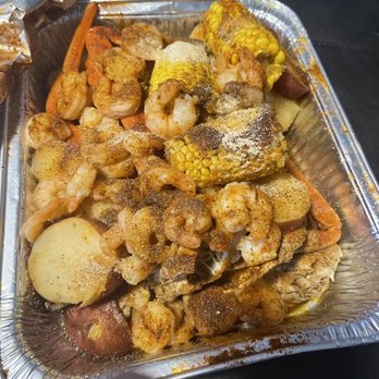 Quality Fresh Seafood - a tray of seafood and potatoes - Seafood Near Me - Forest Park, Georgia Quality Fresh Seafood - a tray of seafood and potatoes - Seafood Near Me - Forest Park, Georgia