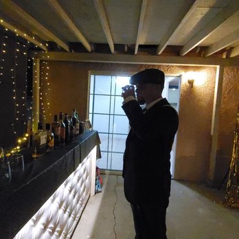 Joker's Party Rental - Birthday Guy enjoying whiskey tastings at the bar - Bounce House Rentals Near Me - Anaheim, California Joker's Party Rental - Birthday Guy enjoying whiskey tastings at the bar - Bounce House Rentals Near Me - Anaheim, California