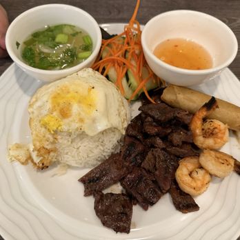 Pho Thien Long Cuisine - Grilled shrimp, grilled beef, and egg roll with egg and rice. It comes with a bowl of pho broth. - Vietnamese Near Me - Glendale, Arizona Pho Thien Long Cuisine - Grilled shrimp, grilled beef, and egg roll with egg and rice. It comes with a bowl of pho broth. - Vietnamese Near Me - Glendale, Arizona