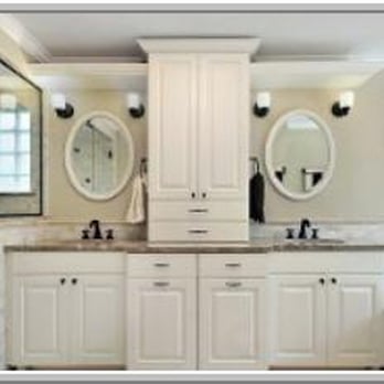 Wasson Roofing and General Contracting - a bathroom with double sinks and a tub - Roofing Near Me - Lancaster, California Wasson Roofing and General Contracting - a bathroom with double sinks and a tub - Roofing Near Me - Lancaster, California