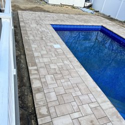 Modern Comfort Pools - Inground pool and patio