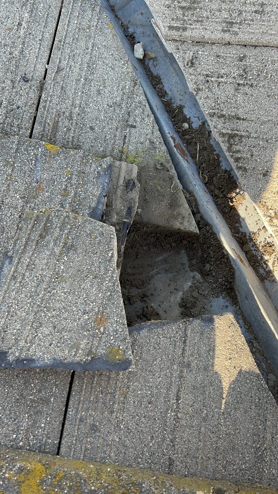 Slide of Lambert Roofing