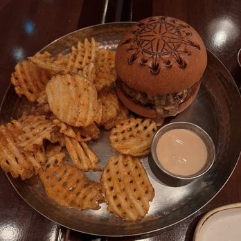 Tiffins Restaurant - Tiffins Signature Burger* - New American Near Me - Lake Buena Vista, Florida Tiffins Restaurant - Tiffins Signature Burger* - New American Near Me - Lake Buena Vista, Florida