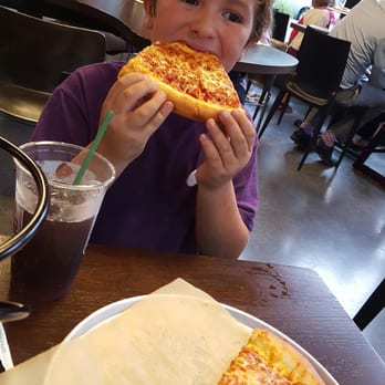 Pagliacci Pizza - Enjoying a slice! - Pizza Near Me - Seattle, Washington Pagliacci Pizza - Enjoying a slice! - Pizza Near Me - Seattle, Washington