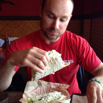 Tiki Tacos - Hard to wrangle these gigantic sour cream covered tacos! - Mexican Near Me - Kapaa, Hawaii