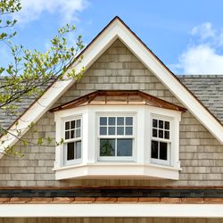 Plum ProExteriors - Known for their elegant look, bow windows provide an extensive collection of windows for the ultimate in natural light.