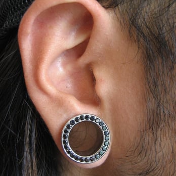 Exotix Studios - Scalpelled lobes by Six, with gemmed eyelets. - Piercing Near Me - Toronto, Ontario Exotix Studios - Scalpelled lobes by Six, with gemmed eyelets. - Piercing Near Me - Toronto, Ontario