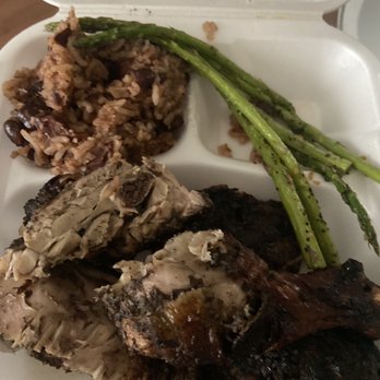 Dilans Carribean Grill - $12 jerk chicken plate w/ rice & peas and asparagus - Food Trucks Near Me Dilans Carribean Grill - $12 jerk chicken plate w/ rice & peas and asparagus - Food Trucks Near Me