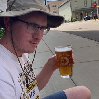 The Grumpy Troll - Grumpy troll holding a beer - Sandwiches Near Me - Mount Horeb, Wisconsin