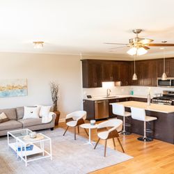Millennial Photos - Open concept living room and kitchen.