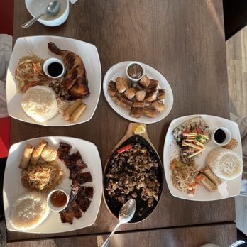 Pinoy Grill & Restaurant - plates of food on a table - Barbeque Near Me - St. Catharines, Ontario Pinoy Grill & Restaurant - plates of food on a table - Barbeque Near Me - St. Catharines, Ontario