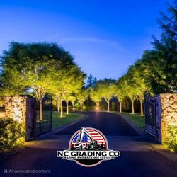 North Carolina Grading Company - Lighting install from July 2024. Accent lighting for entrance and from ground lighting on trees going down driveway