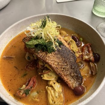 Olive & Sea - Whole branzino, charred onion, couscous, smoked orange butter - Mediterranean Near Me - Fort Lauderdale, Florida Olive & Sea - Whole branzino, charred onion, couscous, smoked orange butter - Mediterranean Near Me - Fort Lauderdale, Florida