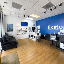 FixStop - Interior of fixstop electronics repair shop in orlando, we specialize in repairing your iphone, cell phone, macbook, laptop, and much more.