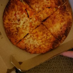 a pizza in a box with a slice taken out of it