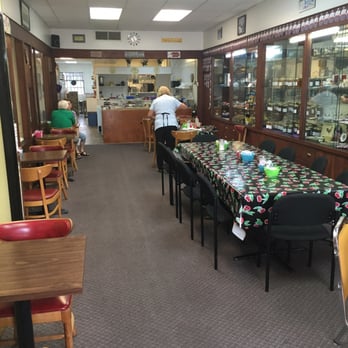 Stella's Cafe - Inside. Quaint, home style joint. Wonderful owners! Antiques and jam for sale in the glass cases on the walls. - Breakfast & Brunch Near Me - Plymouth, North Carolina