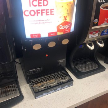 Casey's - a coffee machine and a beverage dispenser - Pizza Near Me - West Point, Nebraska Casey's - a coffee machine and a beverage dispenser - Pizza Near Me - West Point, Nebraska