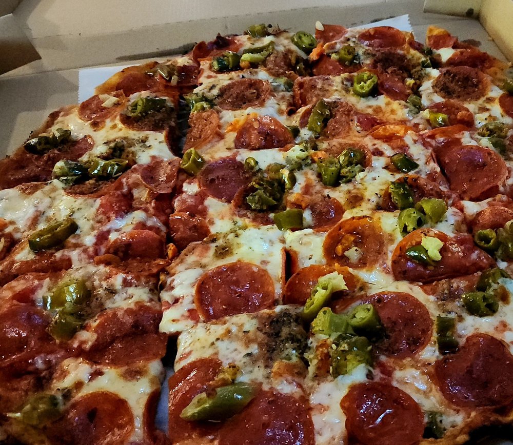 Pucks&pizza Logo
