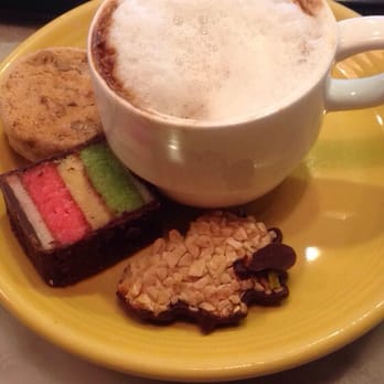 Leli's Bakery - Macchiato with rainbow cookie and a complementary cookie. YUM - Cafes Near Me - Astoria, New York Leli's Bakery - Macchiato with rainbow cookie and a complementary cookie. YUM - Cafes Near Me - Astoria, New York