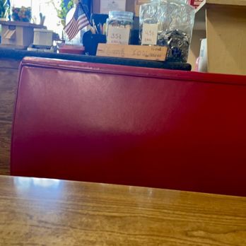 Di's Diner - a wooden table and red booths - Restaurants Near Me - Bulls Gap, Tennessee