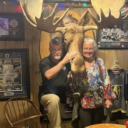Two diners under Mr. Moose Two diners under Mr. Moose