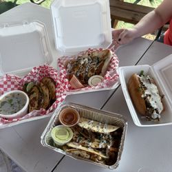 (From left to right) Birria's Cousin Tacos, Chicken Tandoori Tacos, Turban Quesdilla, Turban Cheesesteak