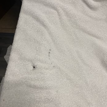 Super 8 by Wyndham Sun Prairie/Madison E - Hole in towel and red stains - Hotels Near Me - Sun Prairie, Wisconsin Super 8 by Wyndham Sun Prairie/Madison E - Hole in towel and red stains - Hotels Near Me - Sun Prairie, Wisconsin
