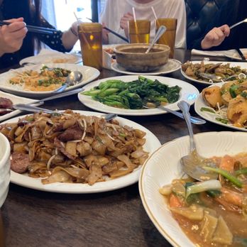 China One Express - a table full of asian food - Chinese Near Me - Overland Park, Kansas China One Express - a table full of asian food - Chinese Near Me - Overland Park, Kansas