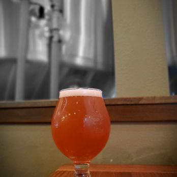 Laughing Sun Brewing - a glass of beer on a table - Music Venues Near Me - Bismarck, North Dakota Laughing Sun Brewing - a glass of beer on a table - Music Venues Near Me - Bismarck, North Dakota