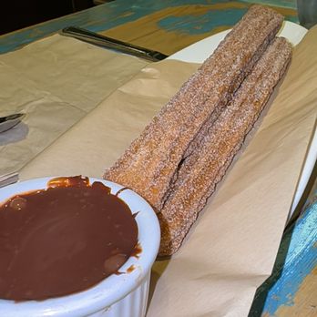 Tavern - Warm churros with a hot chocolate dip - New American Near Me - Coronado, California Tavern - Warm churros with a hot chocolate dip - New American Near Me - Coronado, California