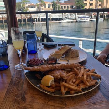 The Cannery - Mimosas, Fish and Chips and Fried Chicken Biscuit, yummy - Seafood Near Me - Newport Beach, California The Cannery - Mimosas, Fish and Chips and Fried Chicken Biscuit, yummy - Seafood Near Me - Newport Beach, California