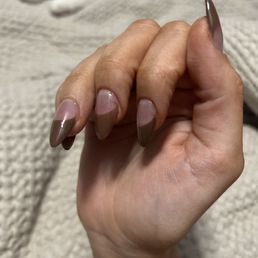 Look at the brown smeared on multiple nails :/ he also only did one coat on the brown and it's super streaky