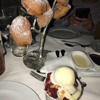 Steak 48 - Red velvet cake with a donut tree in the back - Steakhouses Near Me - Chicago, Illinois