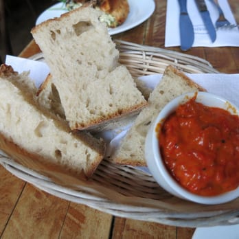 Kafana - Complimentary bread with red pepper spread - Modern European Near Me - New York, New York Kafana - Complimentary bread with red pepper spread - Modern European Near Me - New York, New York