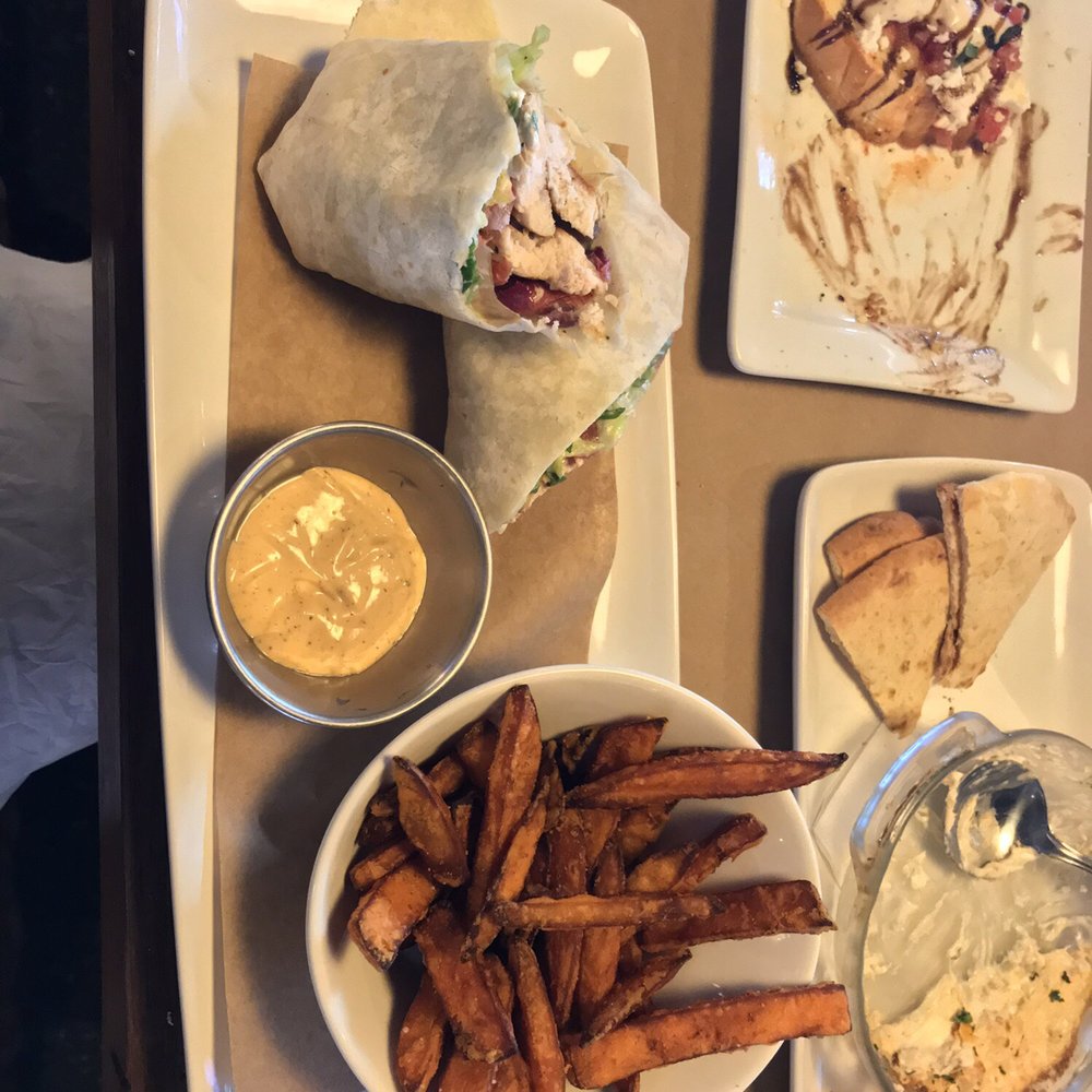 Jack Astor's - Chicken & Goat Cheese wrap with sweet potato fries - Sports Bars Near Me - London, Ontario Jack Astor's - Chicken & Goat Cheese wrap with sweet potato fries - Sports Bars Near Me - London, Ontario
