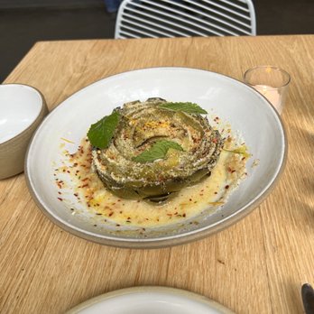 Lilia - Grilled Artichoke, Garlic, Orange, Parmigiano, Breadcrumbs - Italian Near Me - Brooklyn, New York Lilia - Grilled Artichoke, Garlic, Orange, Parmigiano, Breadcrumbs - Italian Near Me - Brooklyn, New York