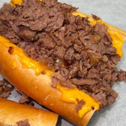Ribeye meat, Cheese Whiz (the Philly way)! Was amazing!