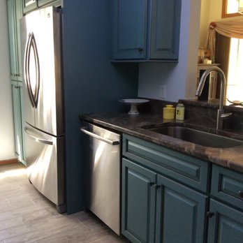 Diversified Kitchens - Looking towards window   Showing pantry and built in refrigerator - Cabinetry Near Me - Shelton, Connecticut
