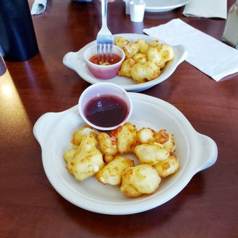 The Cottage Inn - Cheese curd partially eaten - Pubs Near Me - Copenhagen, New York